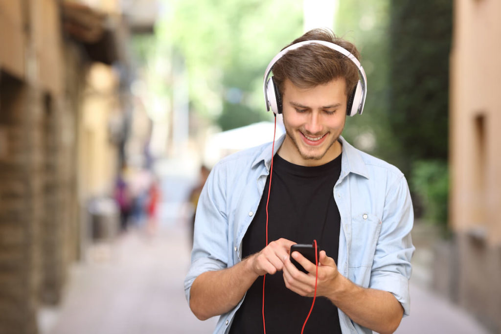 man listening to digital audio
