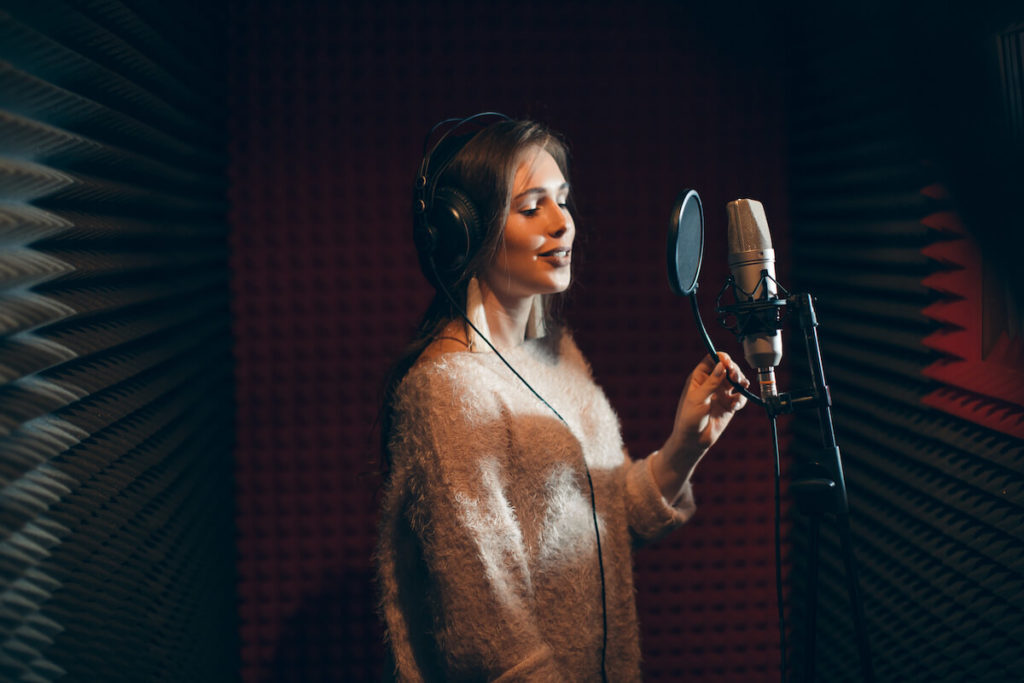 Radio ad: woman recording in a studio