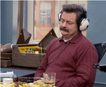 Ron Swanson wearing headphones GIF