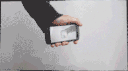 Electronic advertising: person holding a phone GIF