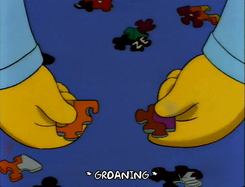 Spotify ad examples: Homer Simpson solving a puzzle GIF